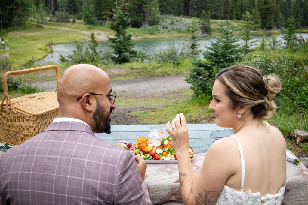 Adventure elopement idea -  enjoying a picnic 